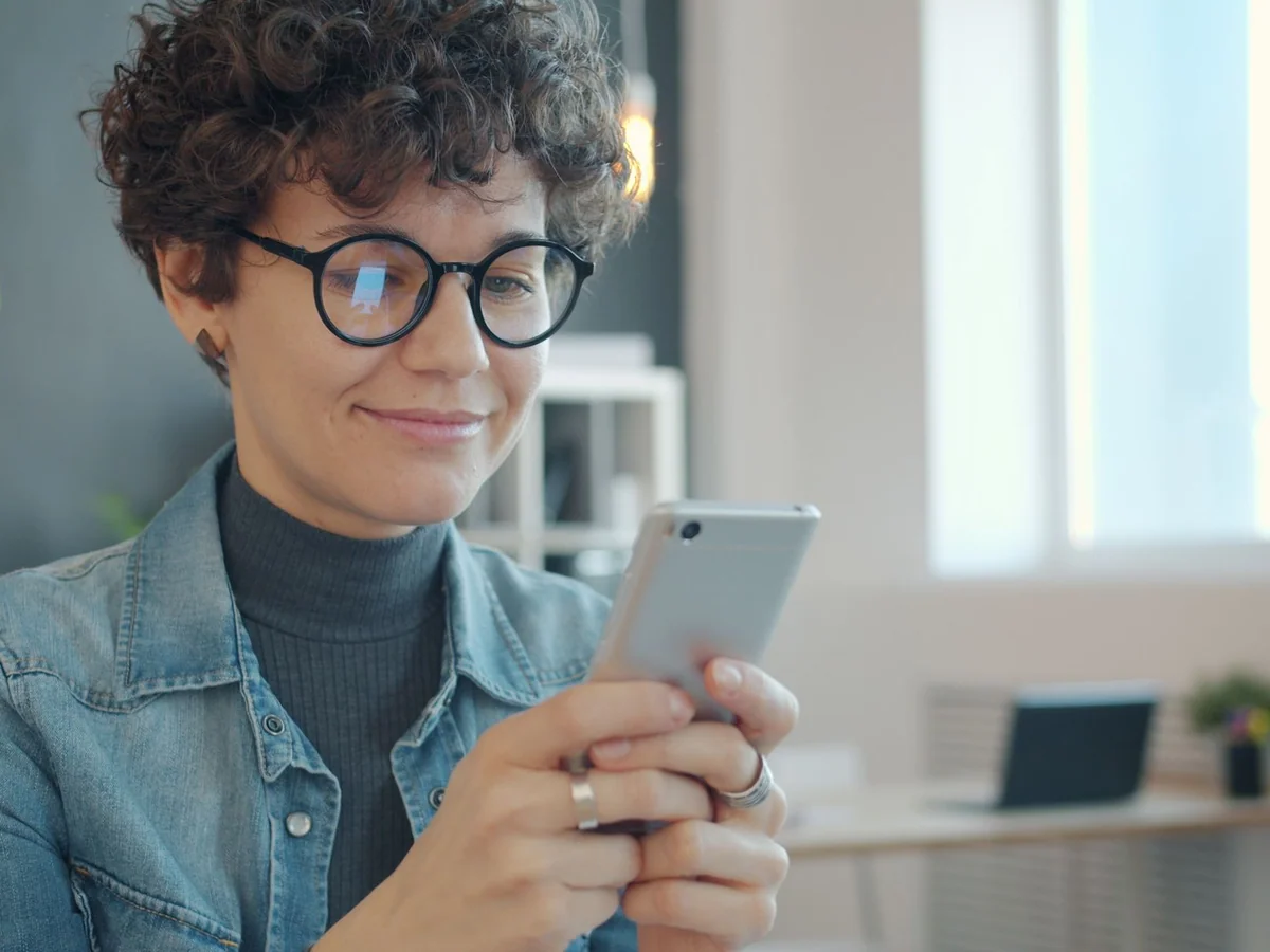 Woman placing her phone in another room during a focus block